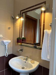 Koupelna v ubytování Agnanti Zitsas Hotel + 23 fotografií
