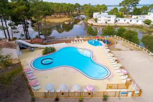 an aerial view of a swimming pool at a resort at Azureva Lacanau in Lacanau