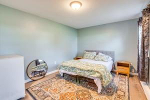 a bedroom with a bed and a mirror at Apartment Rental 2 Mi to Rockland Lake State Park in Valley Cottage