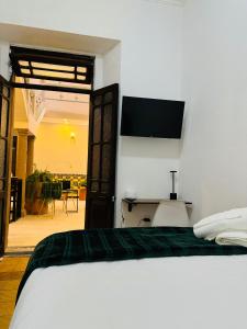 Posteľ alebo postele v izbe v ubytovaní Patio Zaragoza