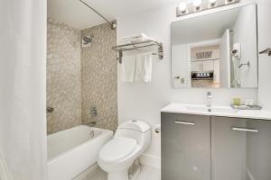 A bathroom at Ocean Views and Resort Perks Sunny Isles Beach Unit