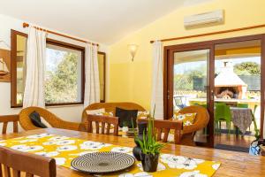 Imagen de la galería de VILLE MONDO a 350 metri dalla spiaggia, en Àrbatax