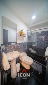 a bathroom with a sink and a toilet and a shower at Beautiful Studio in Barranco in Lima