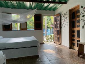 Postel nebo postele na pokoji v ubytování Hostal Luz de Luna + 37 fotografií