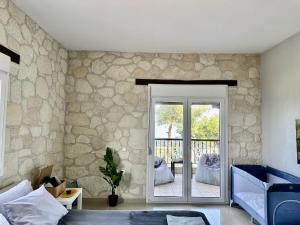 Posezení v ubytování Four Seasons - The Eco Friendly Villa