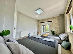 Postel nebo postele na pokoji v ubytování Four Seasons - The Eco Friendly Villa
