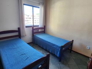 Posteľ alebo postele v izbe v ubytovaní Prainha- Apart 2 quartos a 1 min da praia!