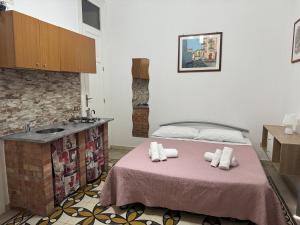 A bed or beds in a room at Marilù
