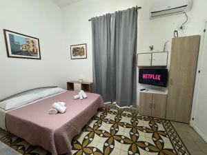 A bed or beds in a room at Marilù