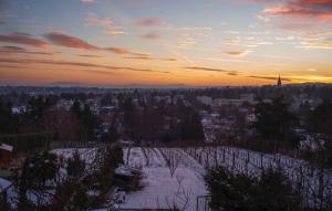 a view of a city in the snow at sunset at Herrlicher Ausblick über Wien in Vienna