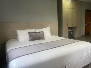 Hotel Portón Sabaneta客房内的一张或多张床位
