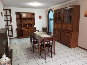 a kitchen with a table and chairs in a room at La casetta della fontanella in Viterbo