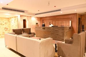 Posezení v ubytování Buyot Malath Serviced Apartment - شقق بيوت ملاذ للشقق المخدومة