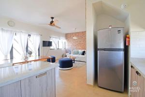 A kitchen or kitchenette at New Townhome Private Patio Parking Pool Onsite