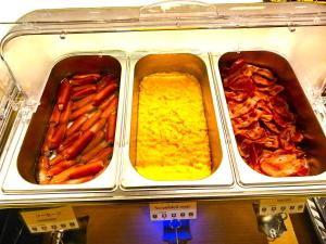 a display case with three trays of different food at Iroha Grand Hotel Kintetsu Nara Ekimae in Nara