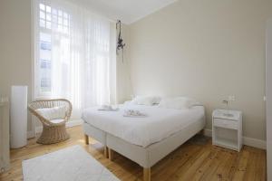 Charming apartment in Biarritz - Welkeys tesisinde bir odada yatak veya yataklar