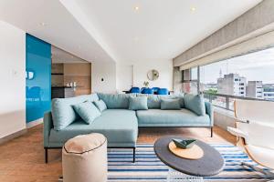 Posezení v ubytování Family friendly Roma Condo 247 Security Parking