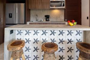Una cocina o cocineta en Ideal Location with Cenote Pools Gym Restaurant