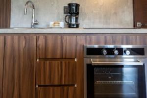 Una cocina o cocineta en Ideal Location with Cenote Pools Gym Restaurant