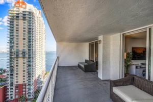 a balcony of a building with a view of the ocean at Stunning 1 BDR 1 BTH • Brickell • Bay & City Views in Miami