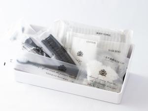 a package of four toothbrushes in a plastic container at APA Hotel AkihabaraSuehirocho Ekimae -Electric Town- in Tokyo