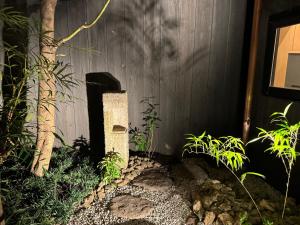 Taman di luar 京都駅そばの一棟貸し京町家 suiten shichijo 萃点七条
