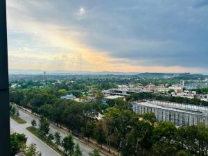 a view of a city with buildings and trees at Executive 2BHK Apt in Elysium tower Isb in Islamabad