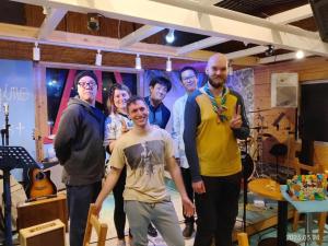 a group of people posing for a picture in a room at ImagineWestOcean - Vacation STAY 15918 in Suo Oshima