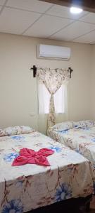 Кровать или кровати в номере Casa Villa Flores