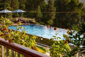 The swimming pool at or close to Tom Hill Boutique Resort & Spa
