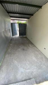 an empty garage with a window in the wall at Apartamento dos habitaciones in Mexicanos