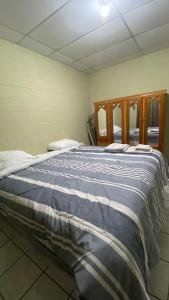 Ένα ή περισσότερα κρεβάτια σε δωμάτιο στο Apartamento dos habitaciones