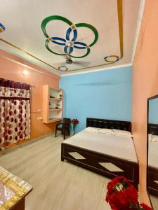 Voodi või voodid majutusasutuse Shivam Home Stay toas