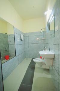 Ένα μπάνιο στο Little Heaven Serviced Villa