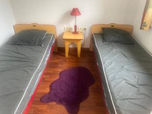 Una cama o camas en una habitación de Maisonnette avec terrasse village vacances, Draps en option