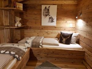 Łóżko lub łóżka w pokoju w obiekcie Lush holiday home with sauna