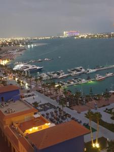 an aerial view of a marina with boats in the water at شاليه فندقي بورتو مارينا الساحل الشمالي in El Alamein