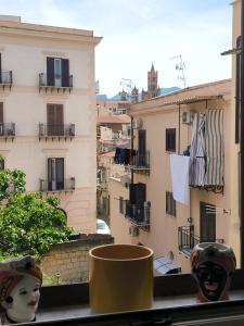 a view from the balcony of a building at Loft le dueffe al capo in Palermo