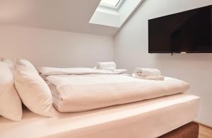 Voodi või voodid majutusasutuse Mountain Suite A10 toas