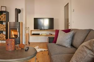 Televiisor ja/või meelelahutuskeskus majutusasutuses Mountain Suite A10