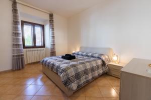 Ένα ή περισσότερα κρεβάτια σε δωμάτιο στο AD Apartment