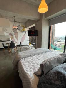 Diua - Artistic and Bohemian apartment 객실 침대