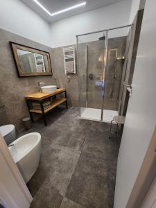 a bathroom with a shower and a tub and a sink at Agriturismo Il Vivaio in Bergamo +33 photos