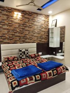 Postel nebo postele na pokoji v ubytování Saanidhya home stay + 22 fotografií