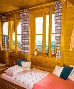 Postel nebo postele na pokoji v ubytování Urlaub am Glatzl Bauernhof