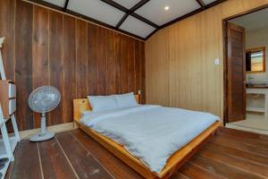 Postel nebo postele na pokoji v ubytování Mơ Home Đà Lạt