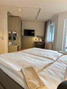 Postel nebo postele na pokoji v ubytování HansenS Haus am Meer