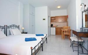 Postel nebo postele na pokoji v ubytování Anniska Hotel