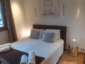 Postel nebo postele na pokoji v ubytování Appartement La Suite Mont-Blanc