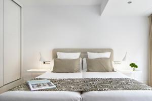 Postel nebo postele na pokoji v ubytování Koxtape Apartment by FeelFree Rentals